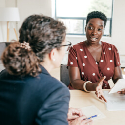 Person discussing administration of a trust with a professional