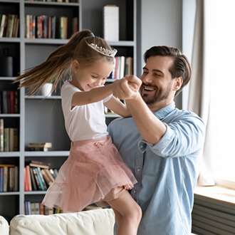 Father plays with daughter